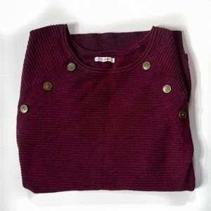 Small Maurice’s maroon sweater with collar buttons.